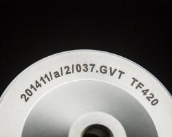 Industrial marking applied to a metallic part for identification
