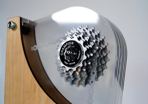 Acrylic trophy featuring bike gear, made with CO2 laser engraver